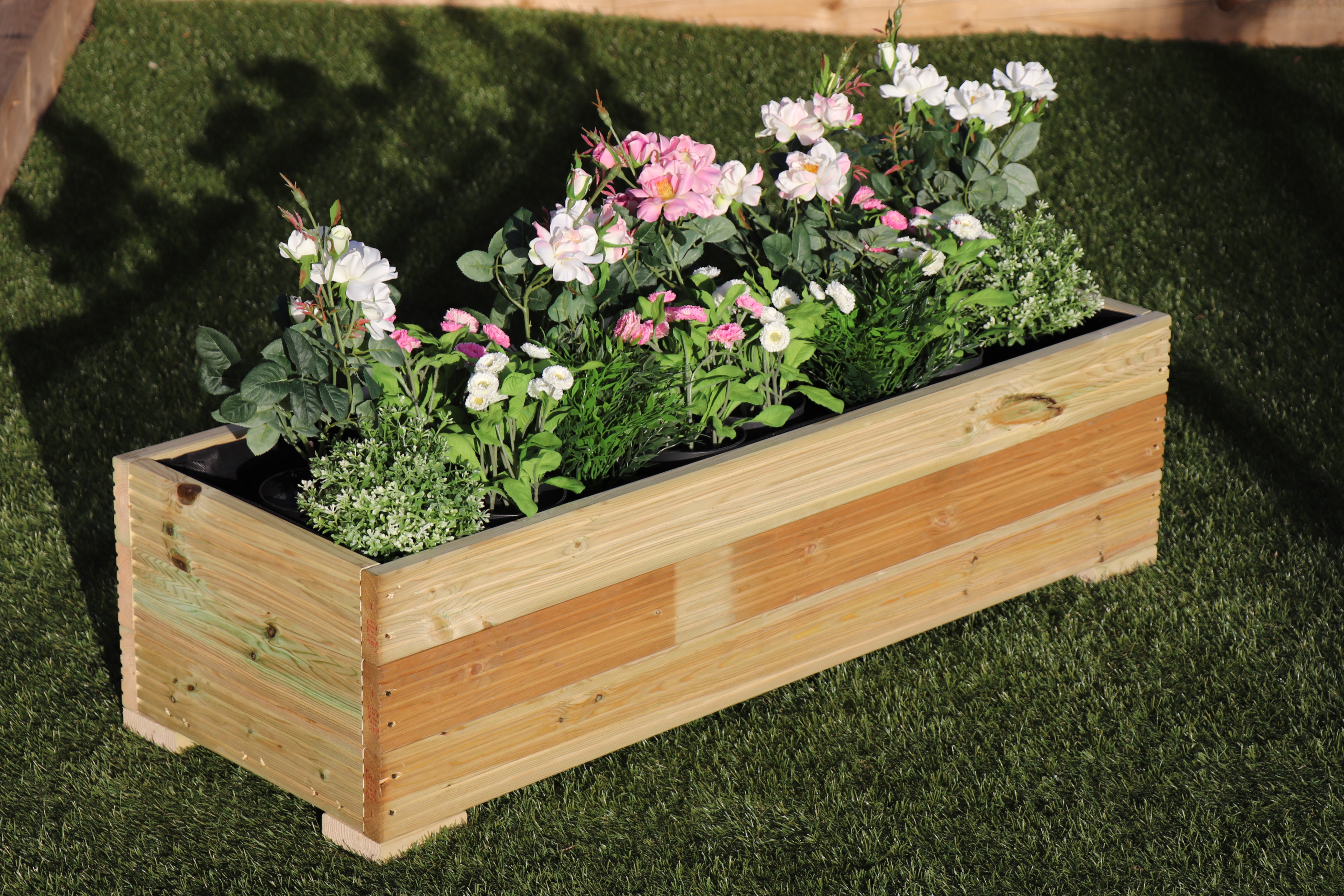 Wooden garden planters and troughs